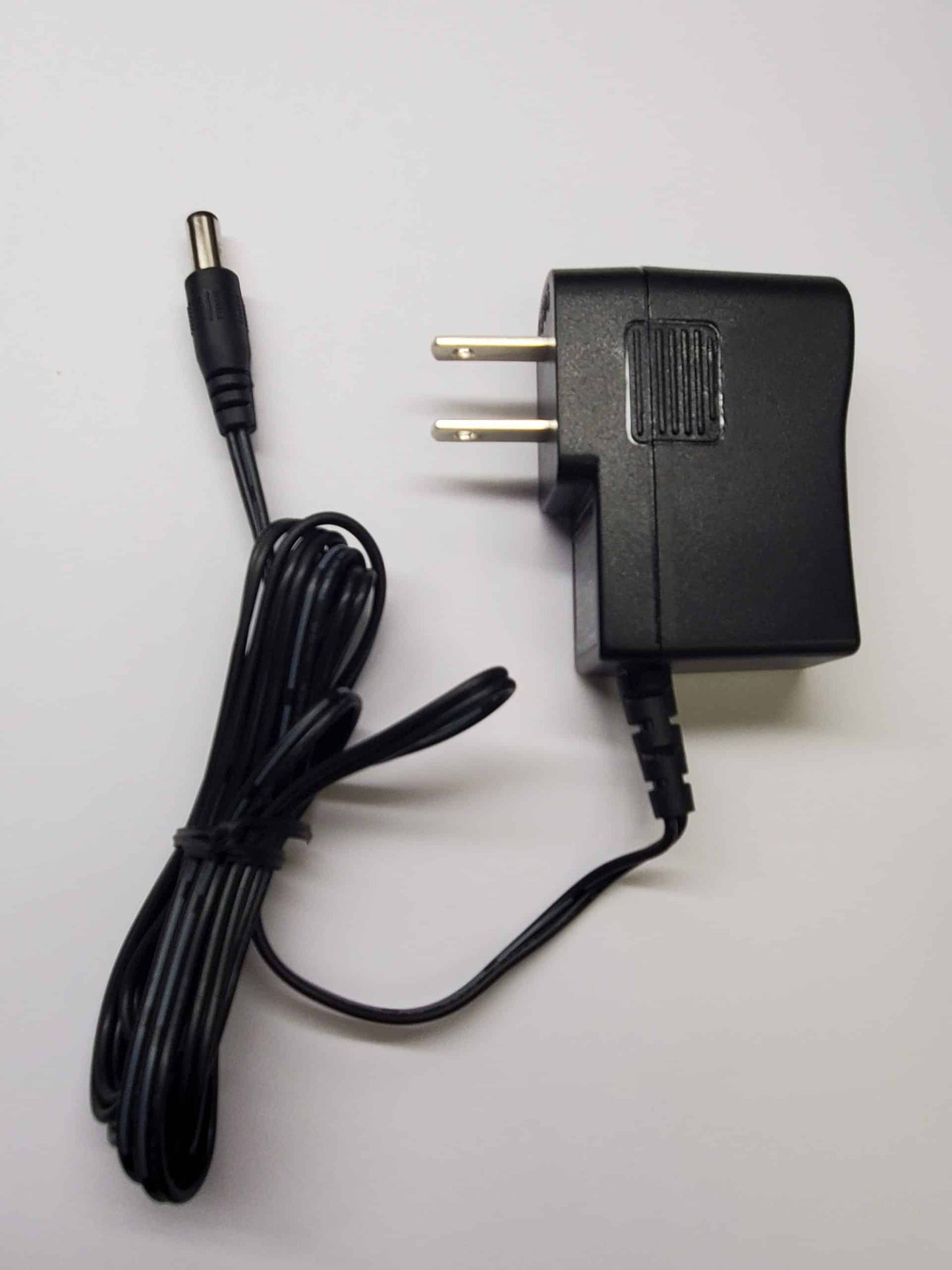 AC Adapter: YF0500200K1-UL