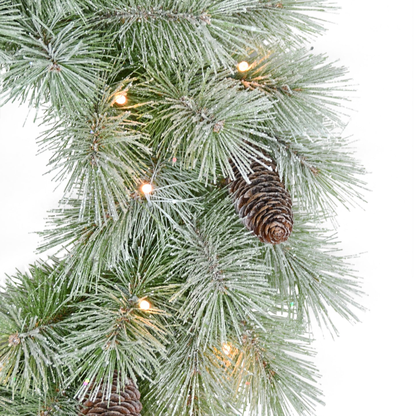 24" Pre-lit B/O Flocked Wreath, 50 Branch Tips, 20 Warm White LED Lights, Pinecones